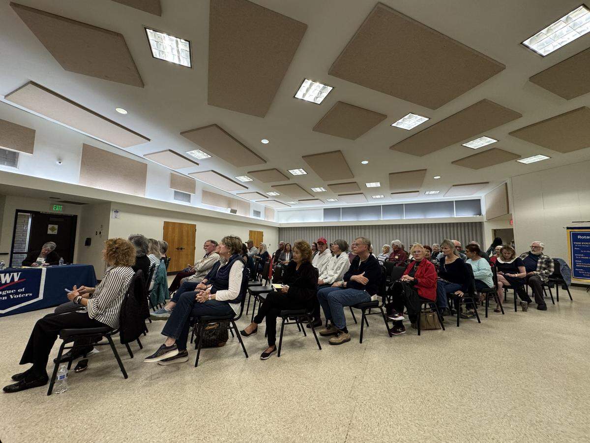 More than a hundred people gathered at the South County Regional Center to watch a District 4 supervisor candidate forum hosted by the League of Women Voters of SLO County on April 29, 2026.