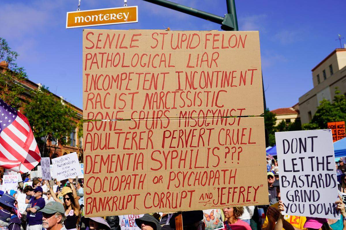 A sign at the No Kings protest in San Luis Obispo on Saturday, March 28, 2026. Organizers estimated around 2,500 people attended the San Luis Obispo protest, with more in Atascadero, Cambria and Grover Beach.
