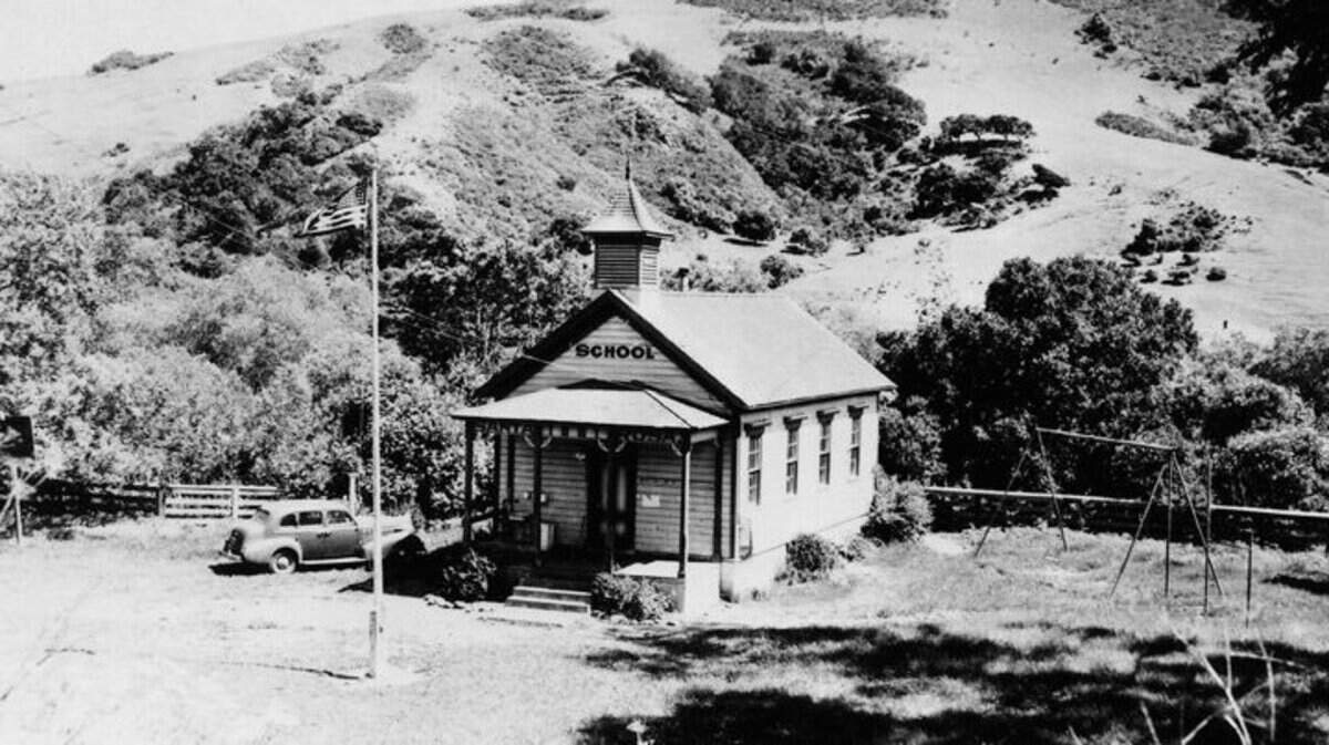 The one-room Santa Rosa schoolhouse nestles along Santa Rosa Creek. The schoolhouse, built in 1881, was moved from its original site 50 years ago.