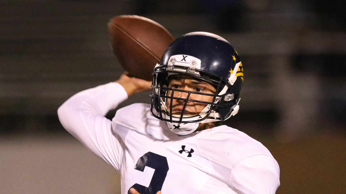 Arroyo Grande High School quarterback Ethan Royal throws in a Mountain League game Friday night at Righetti.