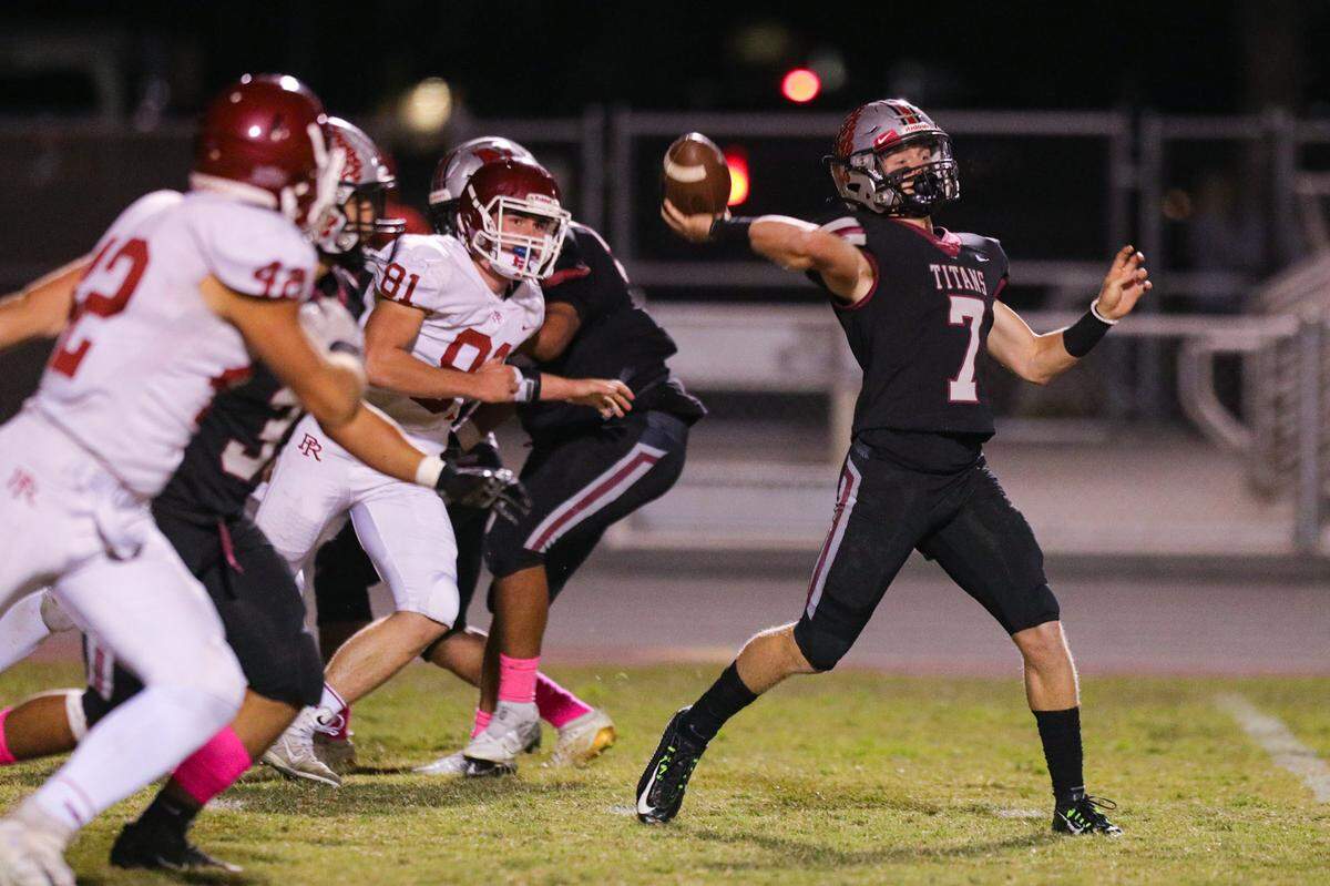 Nate Reese throws under pressure from Paso Robles in October 2021. Nipomo hosted Paso Robles in a Mountain League football match up.