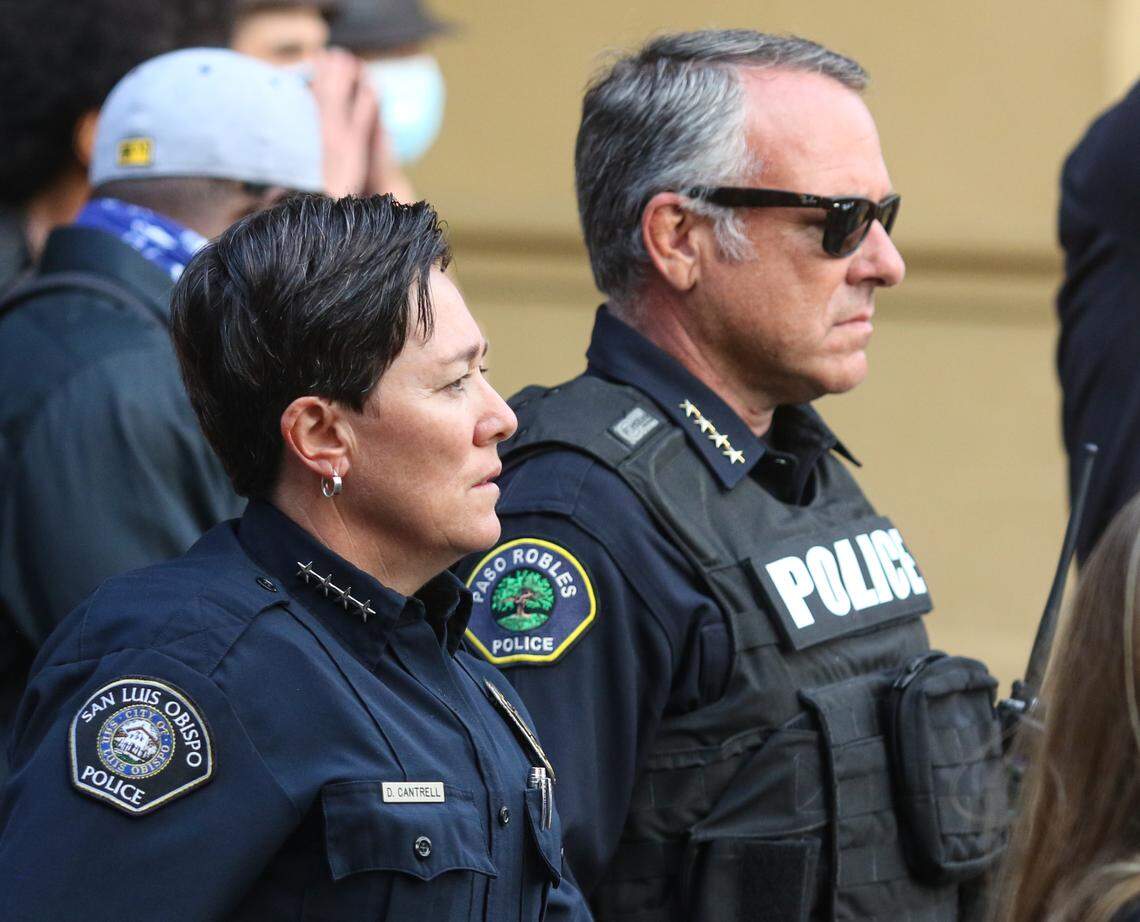 Police chiefs Deanna Cantrell of San Luis Obispo and Ty Lewis of Paso Robles marched with the group in San Luis Obispo on June 4.