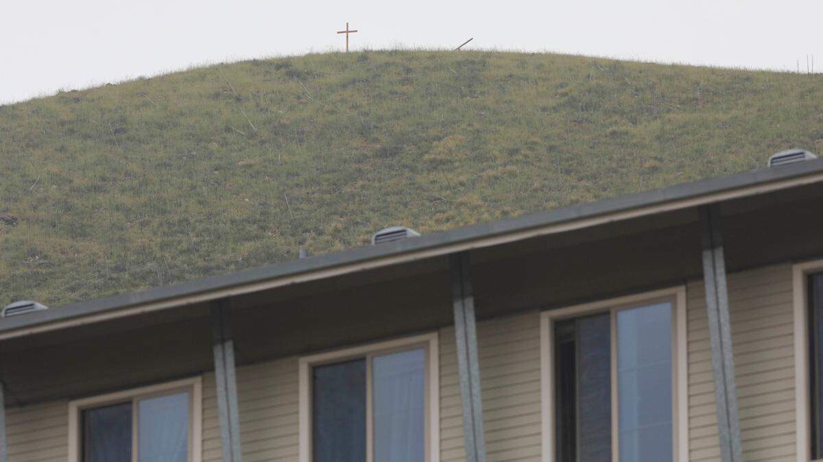 A cross has appeared on the hill behind the Poly Canyon Village living community at Cal Poly.
