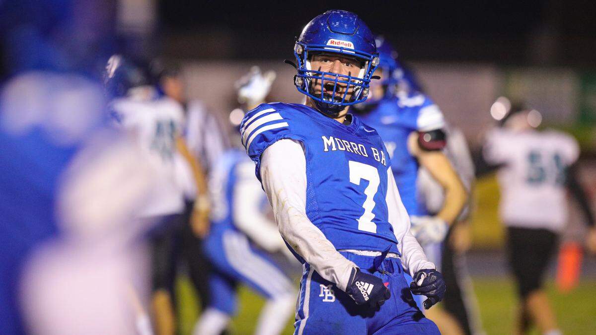 Ethan Lisman celebrates a defensive stop. Morro Bay advanced to the finals with a 29-26 victory over Pioneer Valley in football Nov. 19, 2021.