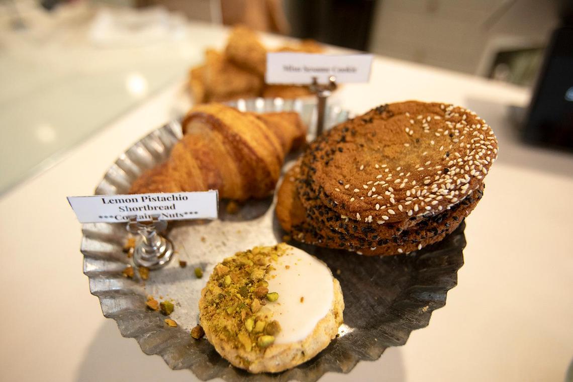 A butter croissant, lemon pistachio shortbread and Misa sesame cookie are among the baked goods at the new Scout Coffee location that opened Tuesday, Feb. 21, 2024, in Morro Bay.