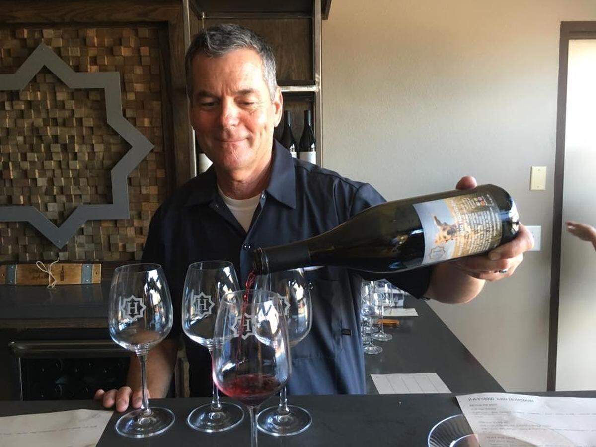 Hayseed and Housdon owner and vintner Ted Ross pours wine at his winery’s new tasting room at 1122 Railroad St. in Paso Robles.