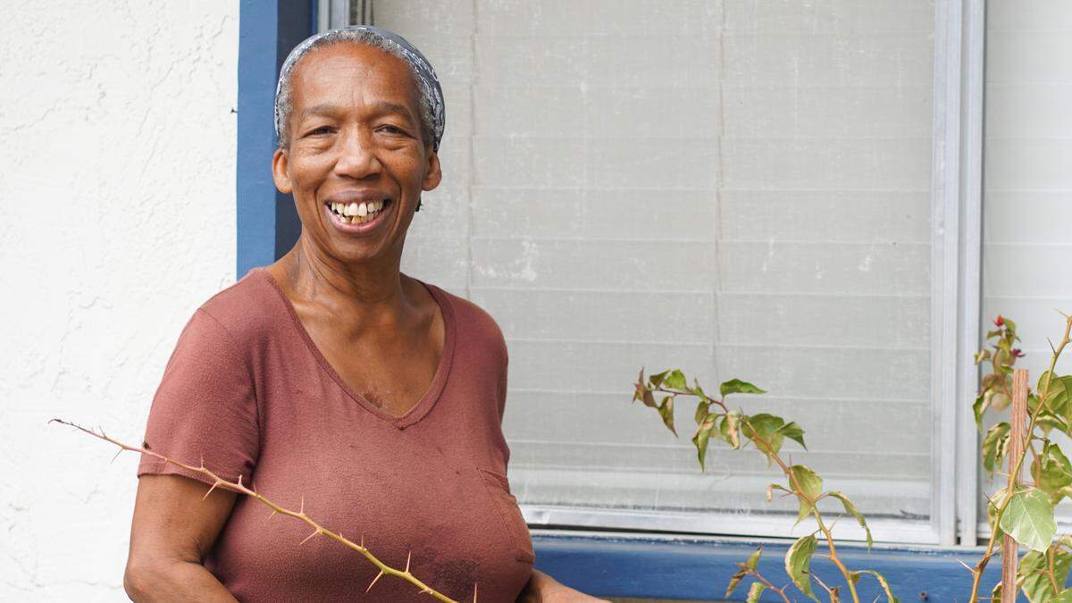 Jazz singer Deborah Gilmore stands on her front porch in Atascadero. Gilmore spent more than two and a half years living in San Luis Obispo County without housing.