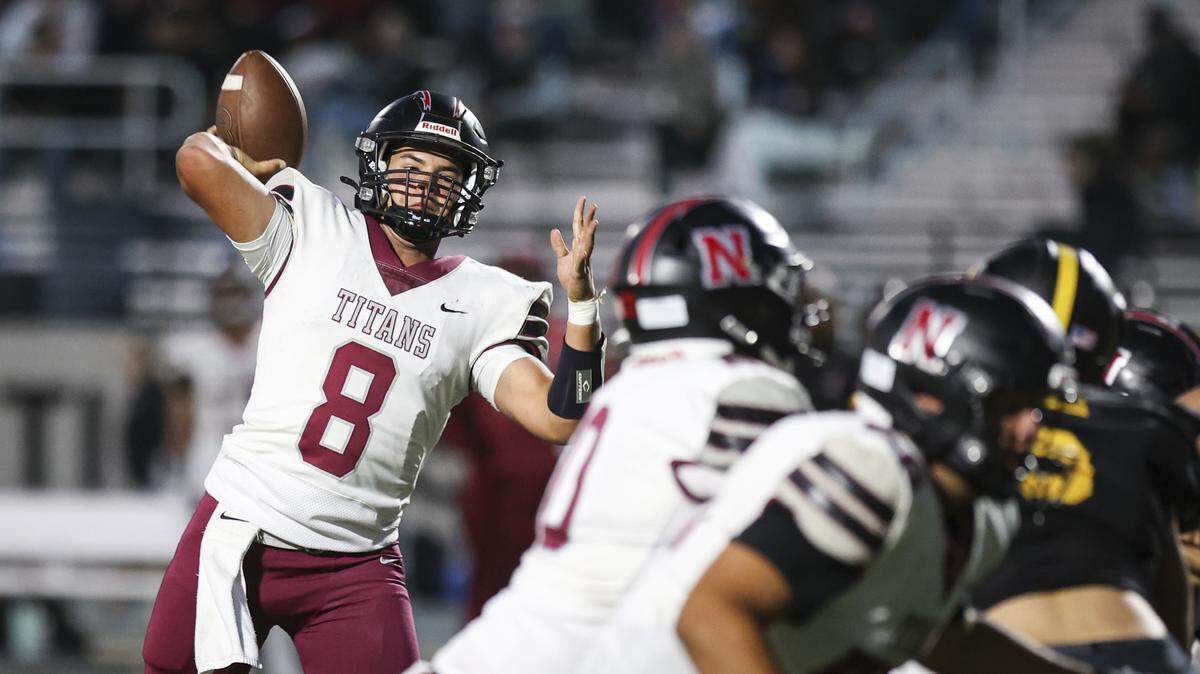 Griffin Groshart makes a pass. San Luis Obispo beat Nipomo 22-16 on Sept. 12, 2025.