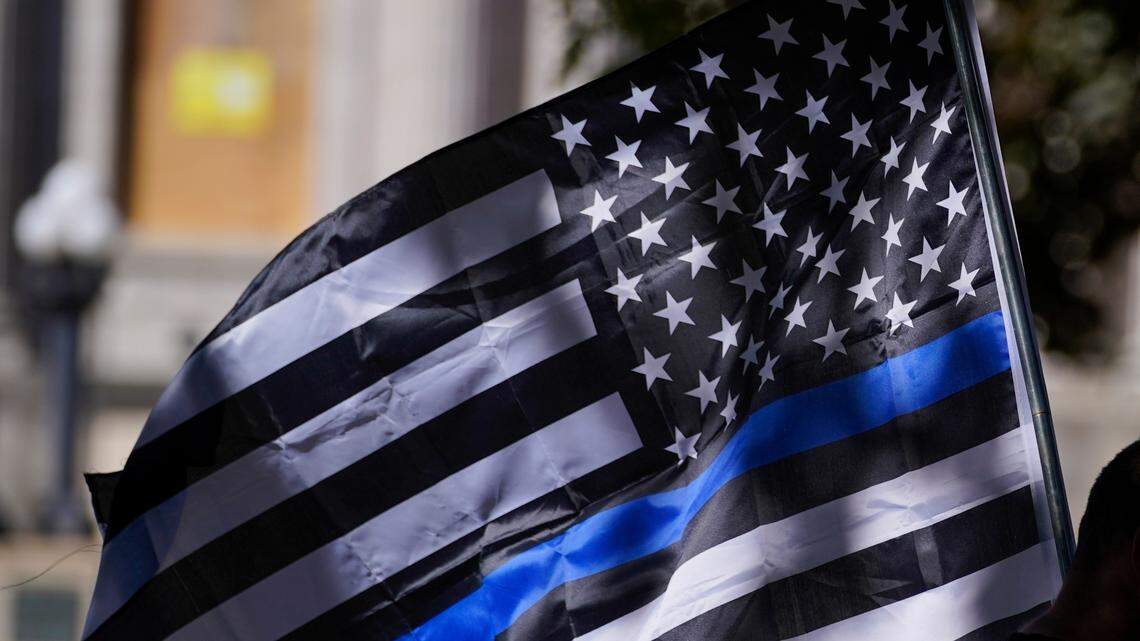 A man, not the one pictured, has sued his local homeowners association who are restricting him from flying a Thin Blue Line flag.