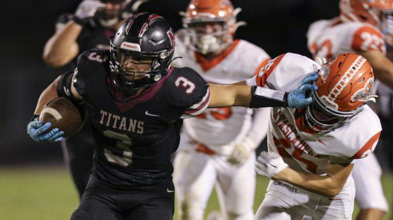 Nipomo beats Atascadero 35-34 in double overtime. See the photos