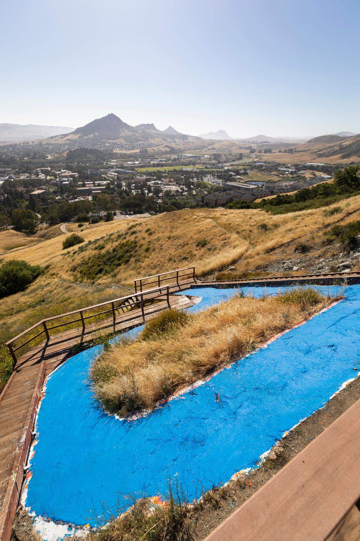 The Cal Poly “P” has been painted blue and the university’s Grand Avenue entrance, the Performing Arts Center and the Alternate Care Site at the Recreation Center have been illuminated with blue light to recognize and thank all health care workers who have been providing support, guidance and care for those affected by the COVID-19 pandemic.