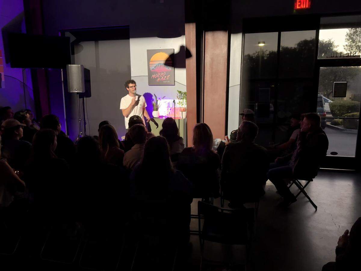 Comedian Jack Scotti jokes about the woes of modern dating to the crowd at Oak and Otter Brewing in San Luis Obispo, California on May 23, 2026.