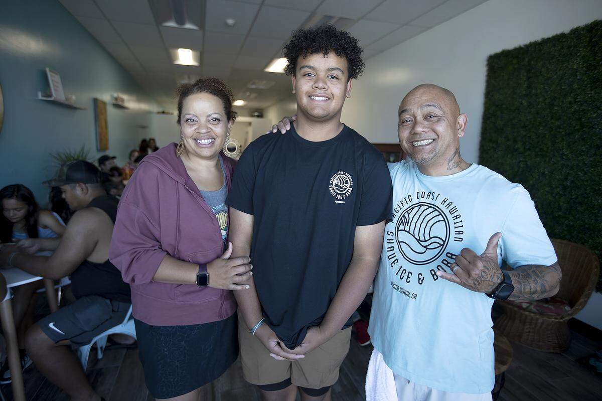 PCH Shave Ice & Boba co-owner Diana Cabrera, left, is pictured with her son Elijah and husband, Eric. The Pismo Beach business held its grand opening on Saturday, July 9, 2022.