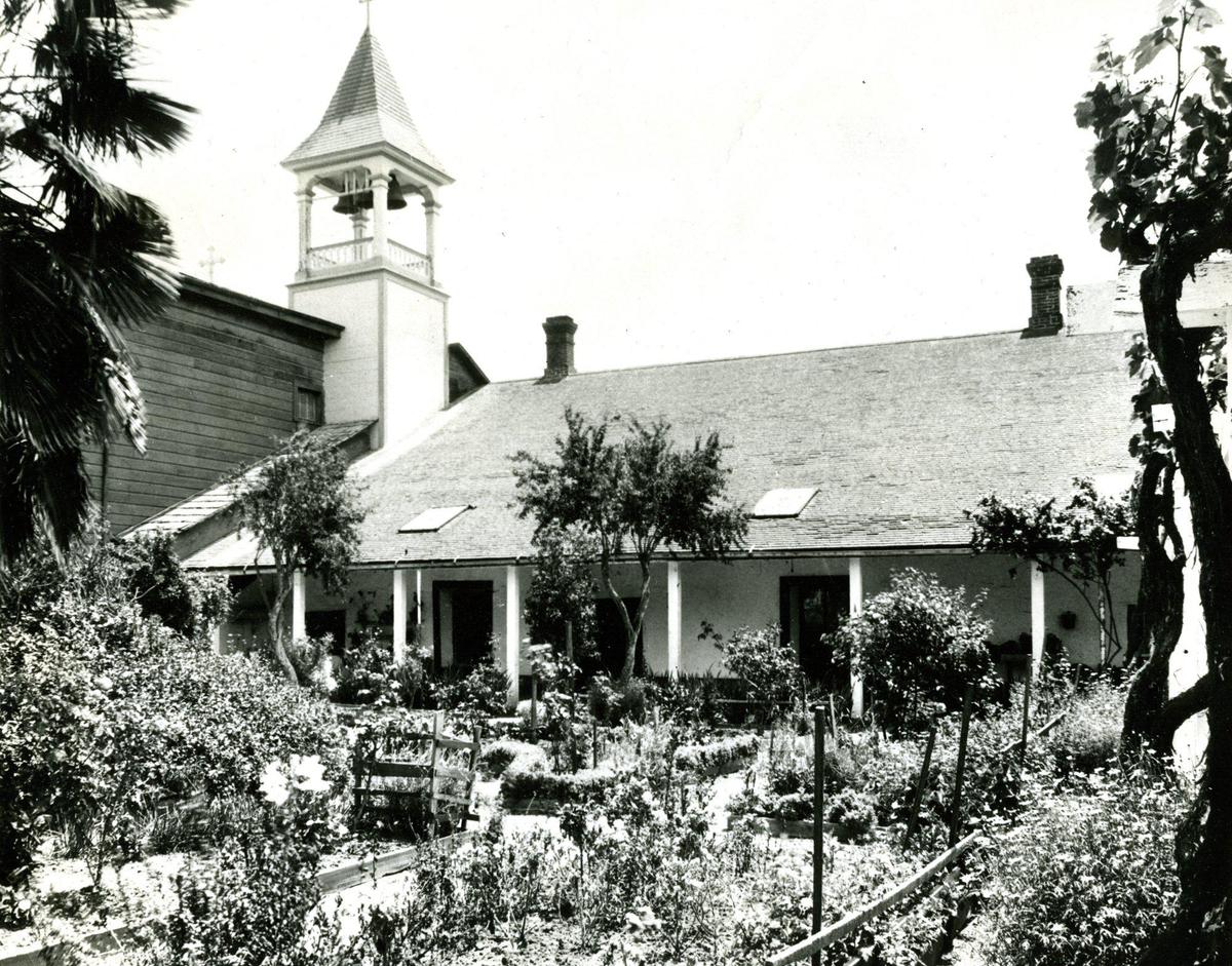In the late 1800s, the adobe was covered with clapboard and a New England style bell tower was installed.