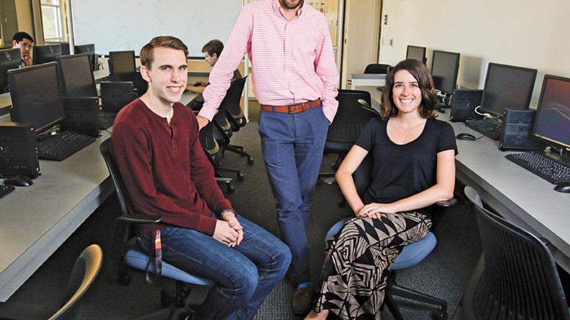 Cal Poly computer science professor Zachary Peterson, center, leads the computer cybersecurity program. He's shown with the campus' computer security club leaders Nathan Lemay, left, and Cristina Formaini.