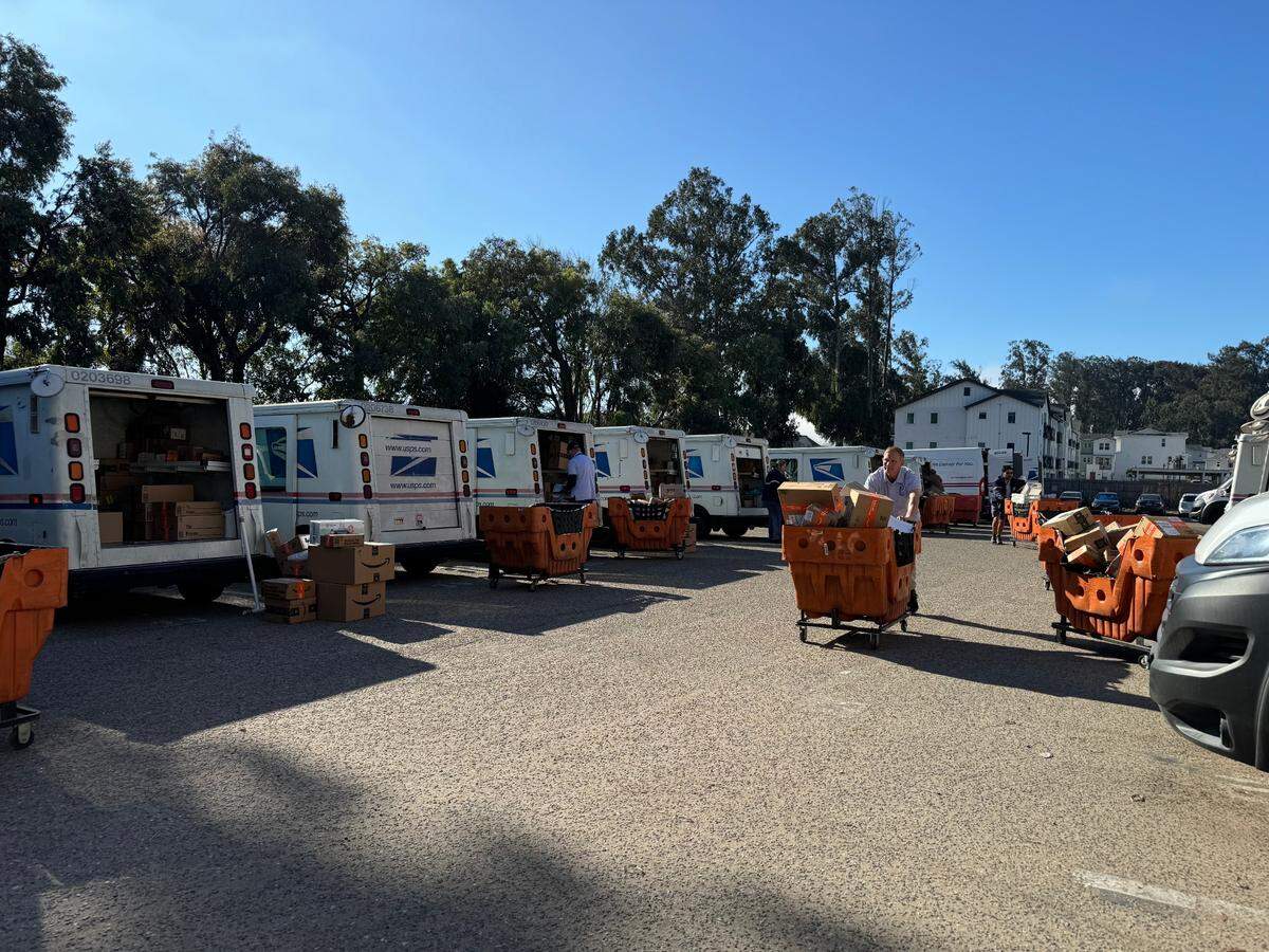 The holiday season is the busiest time of year for U.S. Postal Service workers, according to Mark Martinez, postmaster for San Luis Obispo. Letter carriers often work up to 12-hour days, he said.