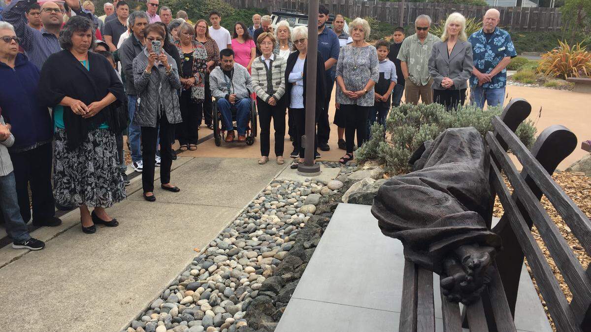 The entryway to Cambria’s Santa Rosa Catholic Church has a powerful new artistic addition: A life-size bronze statue of “Homeless Jesus.”