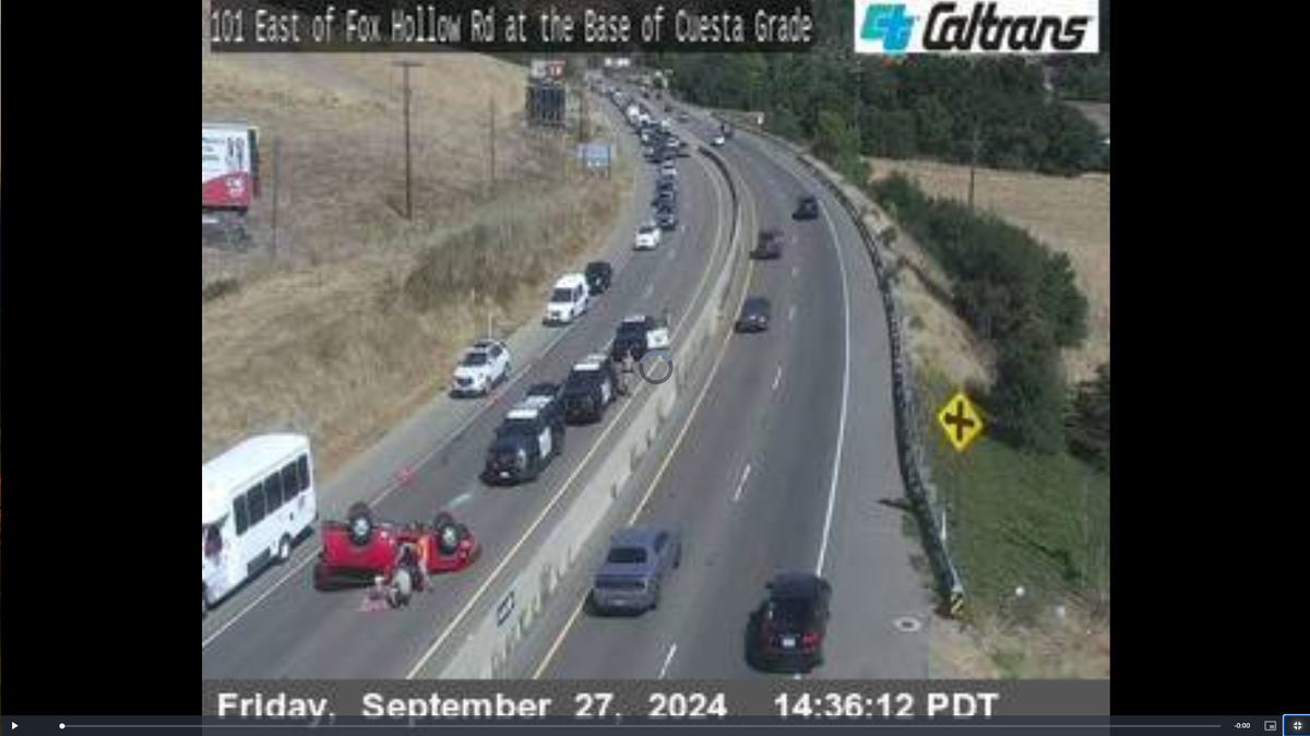 A car flipped onto its roof on Highway 101 outside of San Luis Obispo on Sept. 27, 2024.