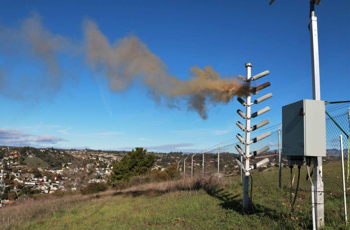 The flare tree in Arroyo Grande spews silver iodide into the air during a demonstration of the cloud seeding equipment that San Luis Obispo County is utilizing through a contracted company, North American Weather Consultants, to create more rain over the Lopez Lake watershed.