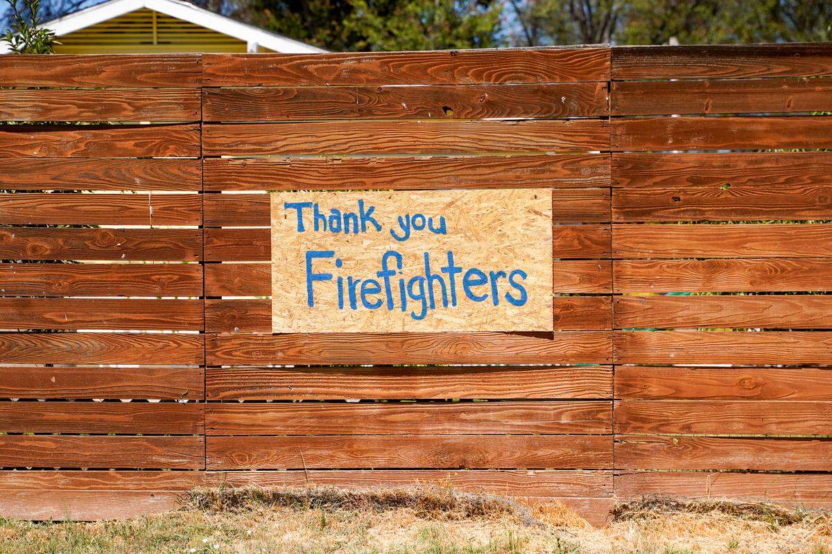 A sign thanking firefighters for their work stopping the Gifford Fire on display in downtown Santa Margarita on Wednesday, Aug. 13, 2025.