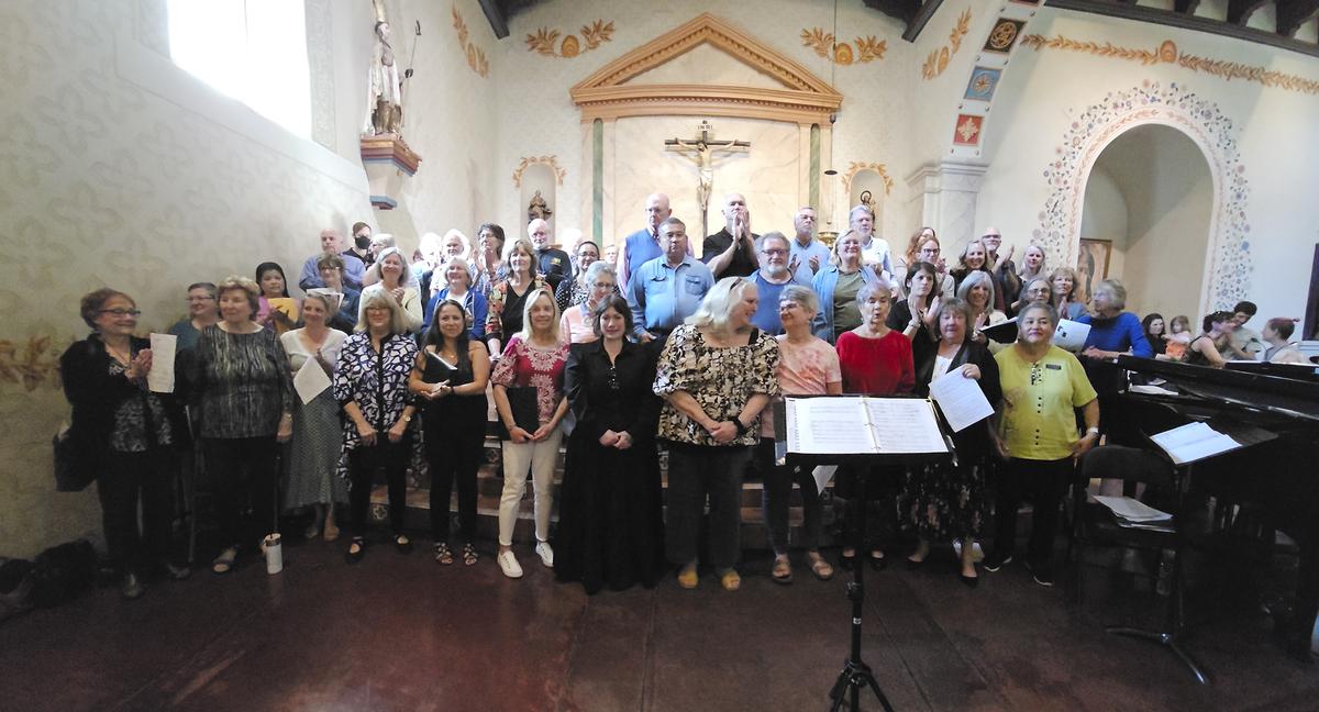 A memorial sing-along was held on Feb. 24, 2024, at the Mission San Luis Obispo to honor longtime choir director Gary Lamprecht, who died on Wednesday. The choir received a resounding applause after the event with Melody Svennungsen front and center.