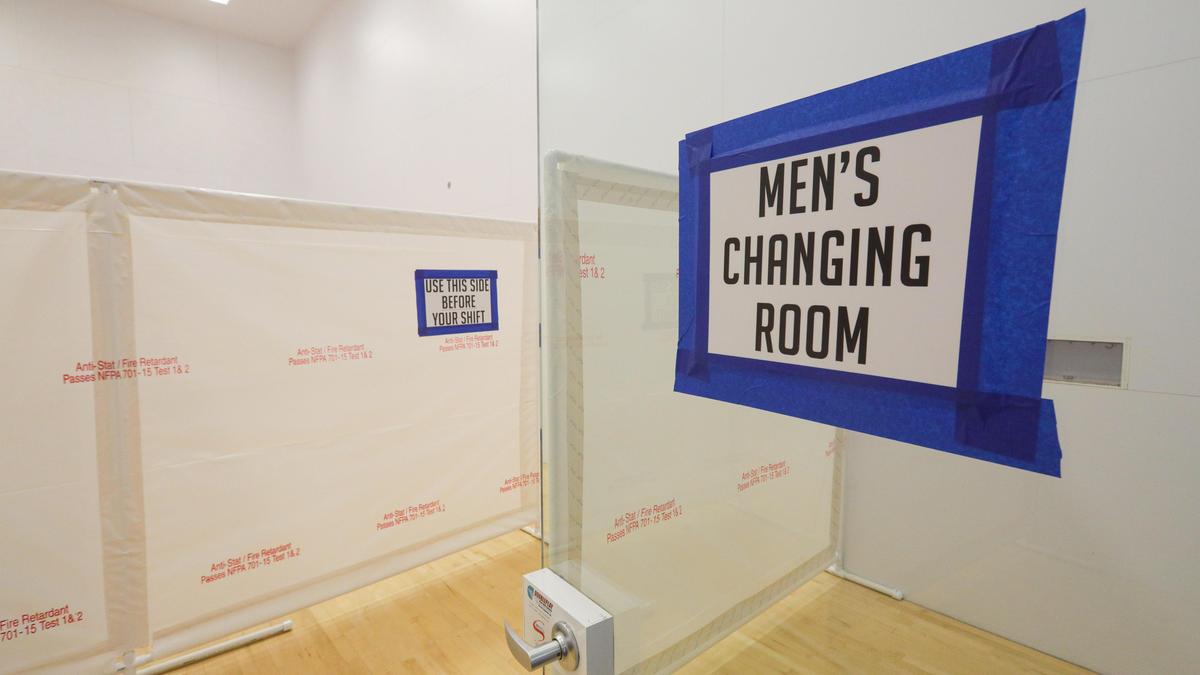 One of the racquetball courts at the Cal Poly Rec Center has been converted into a changing room for staff.