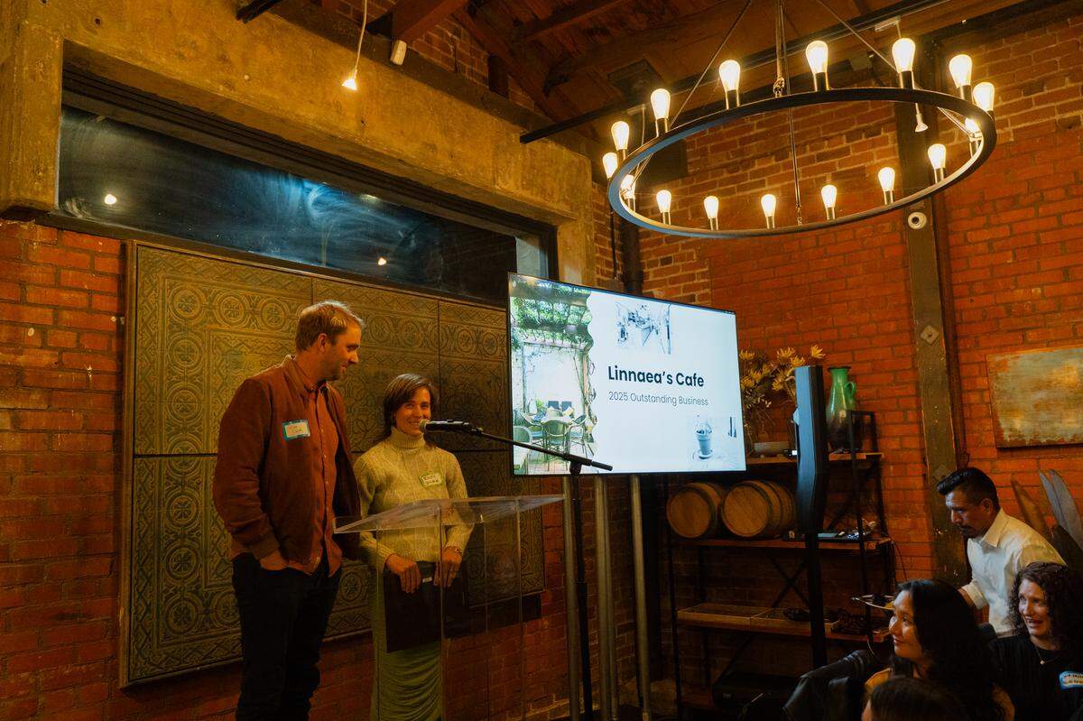 Alex and Rusty Quirk of Linnaea’s Cafe accept Downtown’s SLO’s 2025 Outstanding Business award March 2, 2026.
