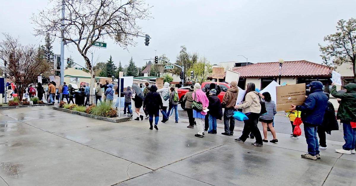 The protester walked down Spring Street en route Paso City Park. The Mixteco Indígena Community Organizing Project and other immigrant advocacy organizations led a march in Paso Robles to protest deportation and President Donald Trump’s immigration policies on Sunday, March 30, 2025.