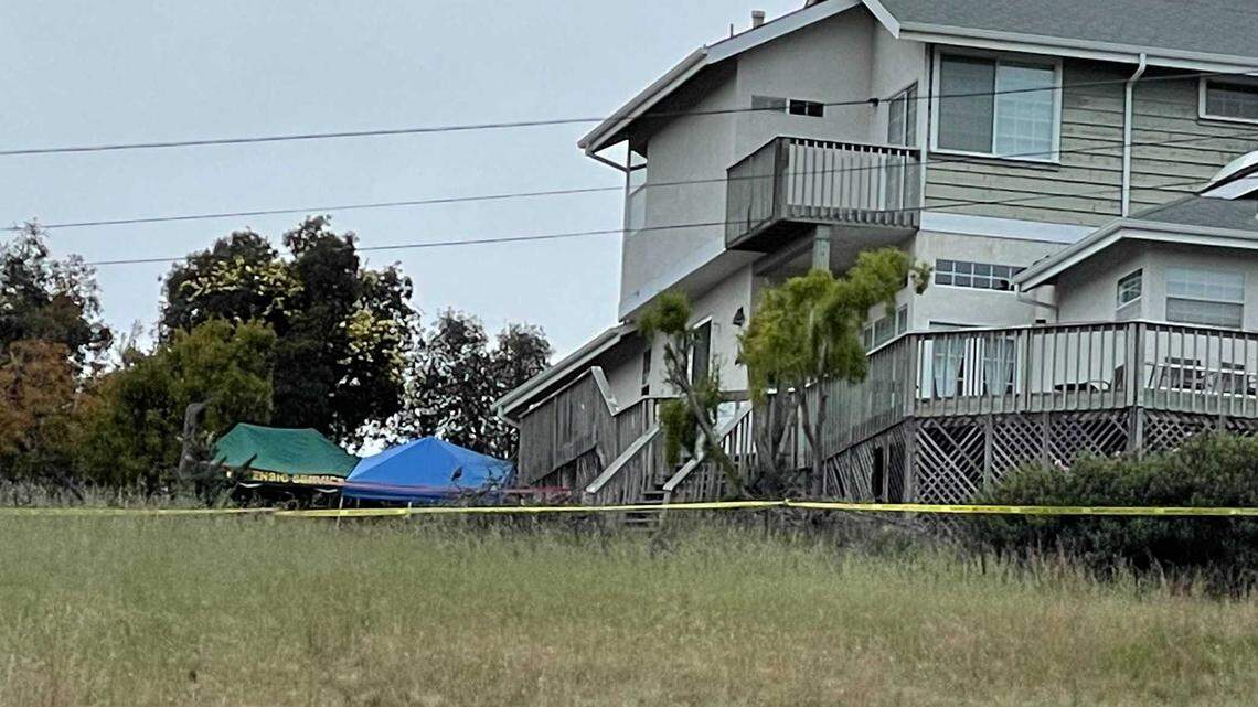A green Forensic Services tent can be seen next to a blue tent in the backyard of Ruben Flores’ Arroyo Grande home on Tuesday, April 13, 2021. Flores is the father of Paul Flores, named the prime suspect in the 1996 disappearance of missing Cal Poly student Kristin Smart. Ruben and Paul Flores were arrested Tuesday in connection with the case.
