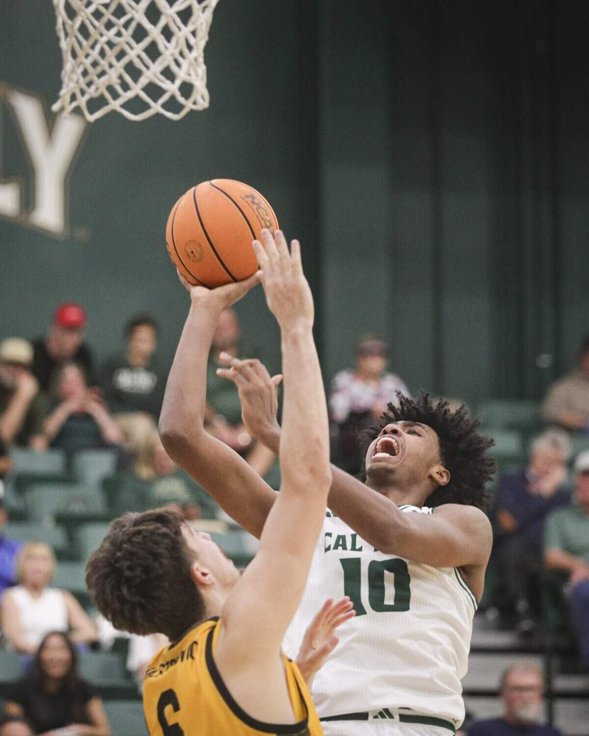 Hamad Mousa takes a shot to the basket. He was the Mustang's leading scorer with 29 points. Cal Poly beat Long Beach State102-92 on Feb. 26, 2026.