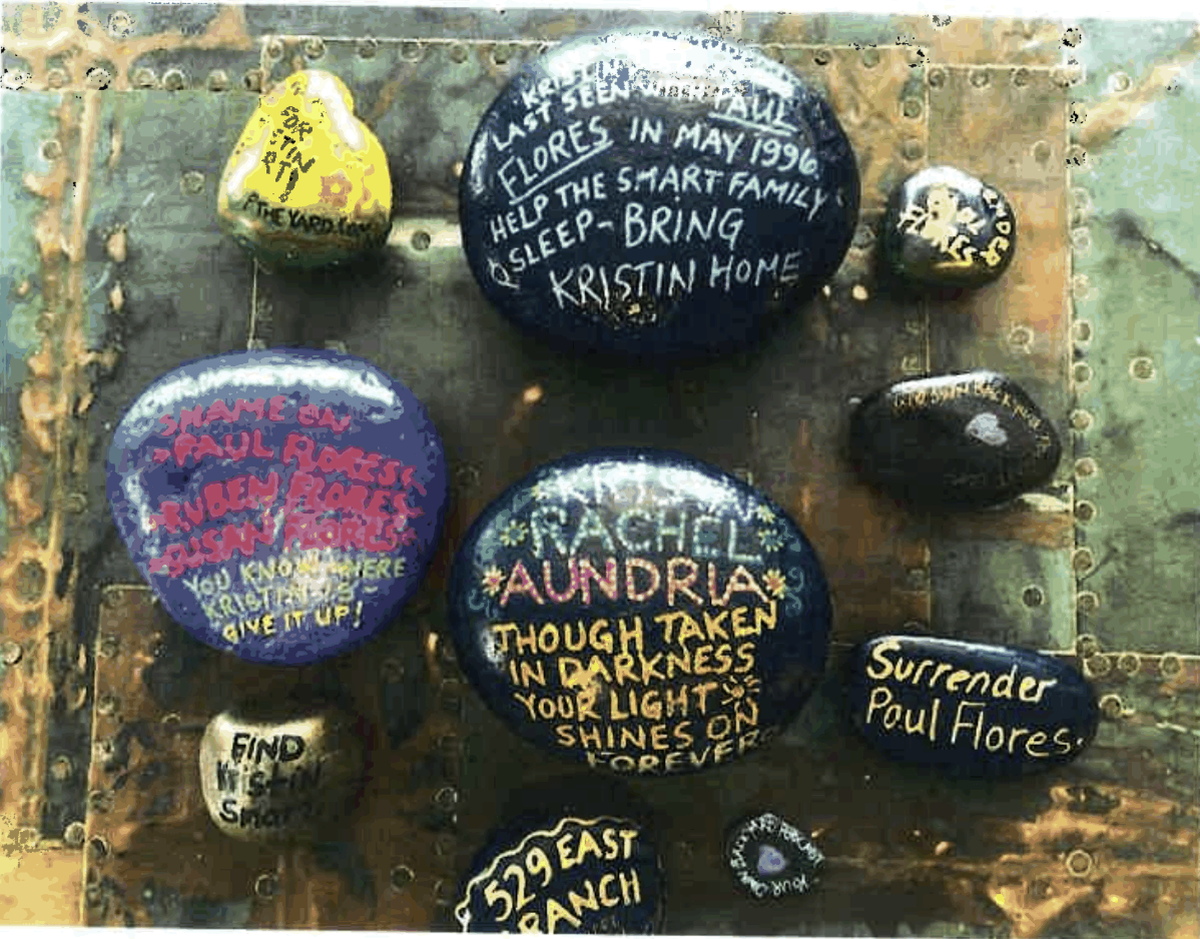 Rocks Susan Flores says were thrown outside her house, according to unsealed court documents.
