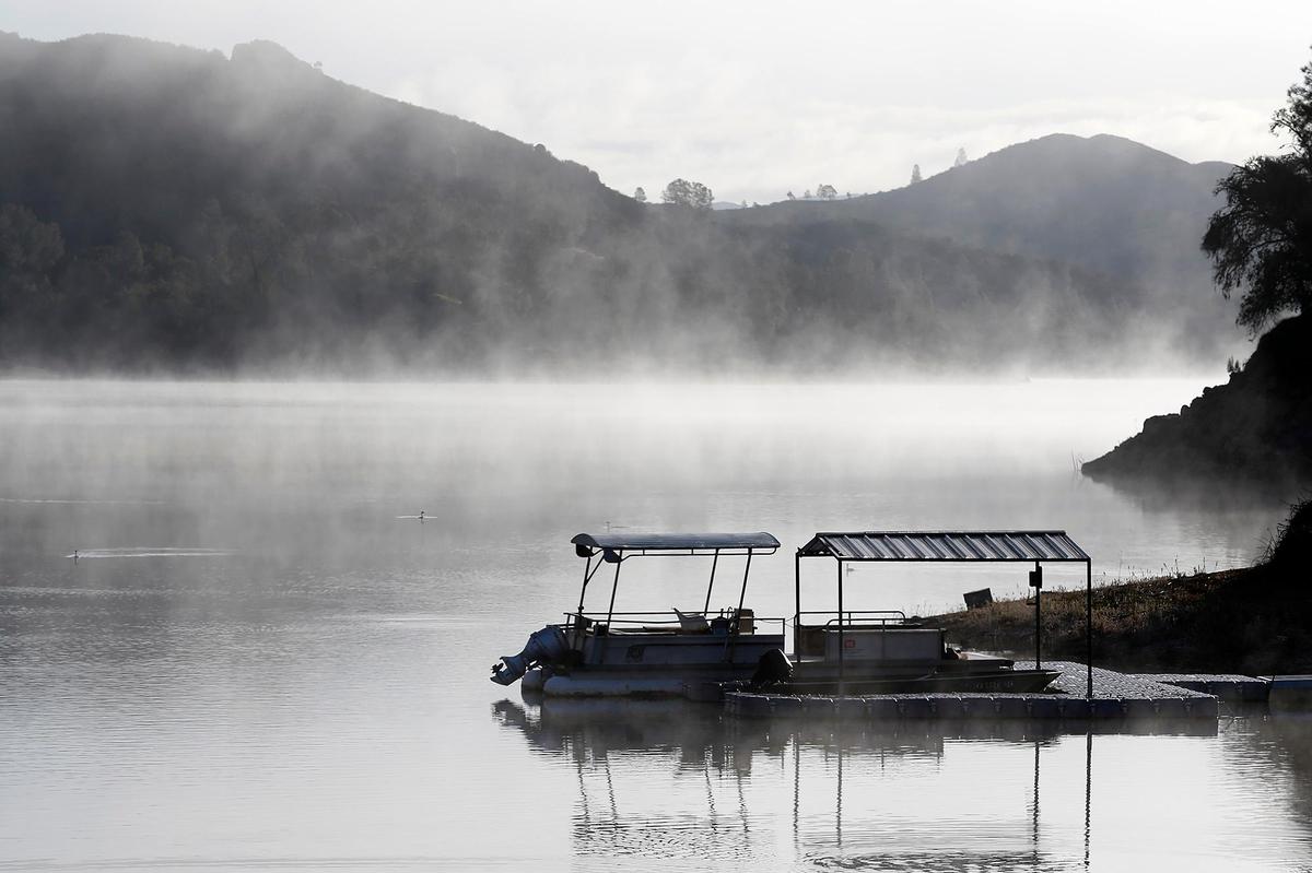 Santa Margarita Lake was capped with mist and the eerie sounds of different species of birds on a frosty Wednesday morning, Feb. 23, 2022.
