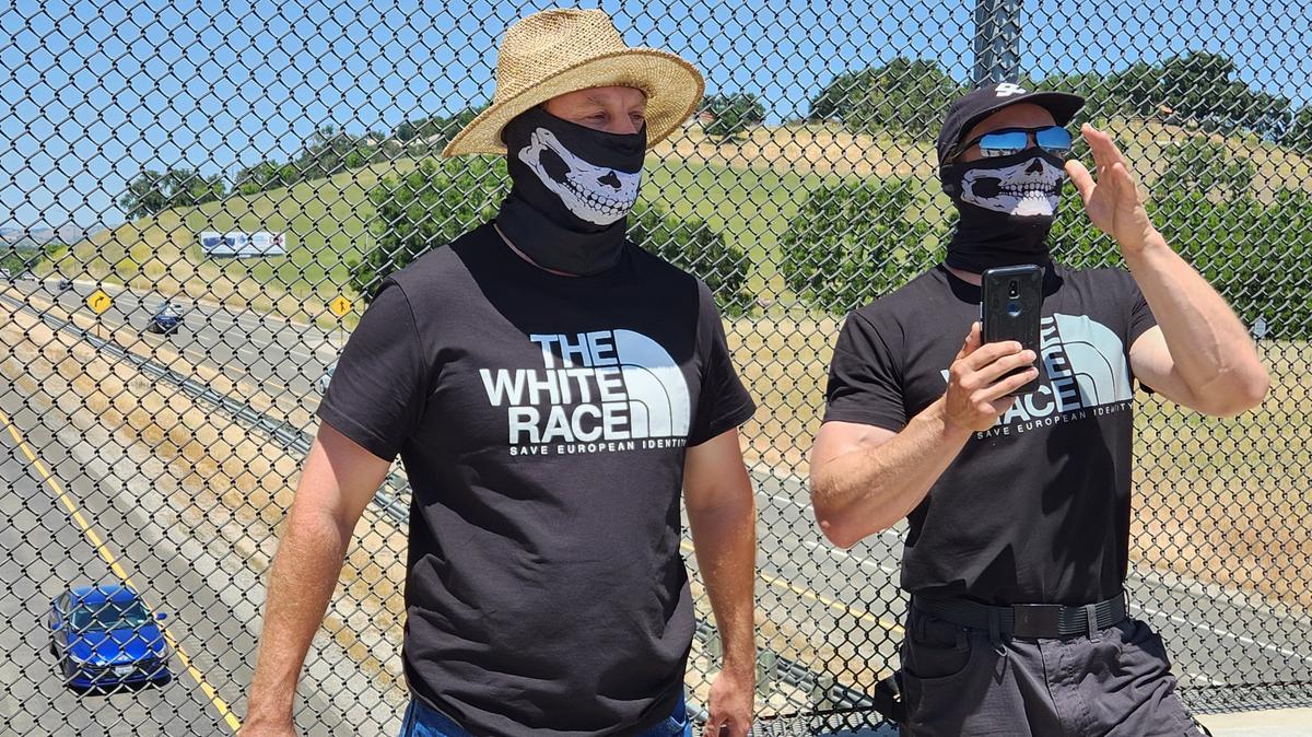 White supremacists refused requests to remove their masks, according to observers who were on the Templeton overpass when the men displayed their “Embrace White Pride banner.”