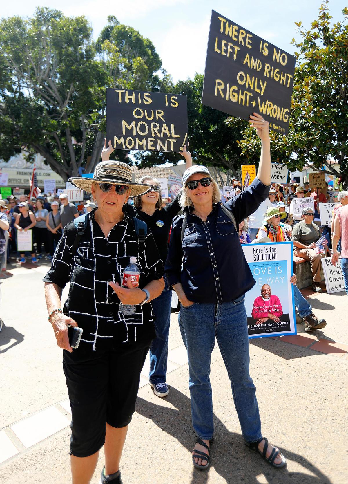 Thousands of people gather at San Luis Obispo Superior Court in California as part of the “Hands Off!” rally to protest President Donald Trump and his advisor Elon Musk.