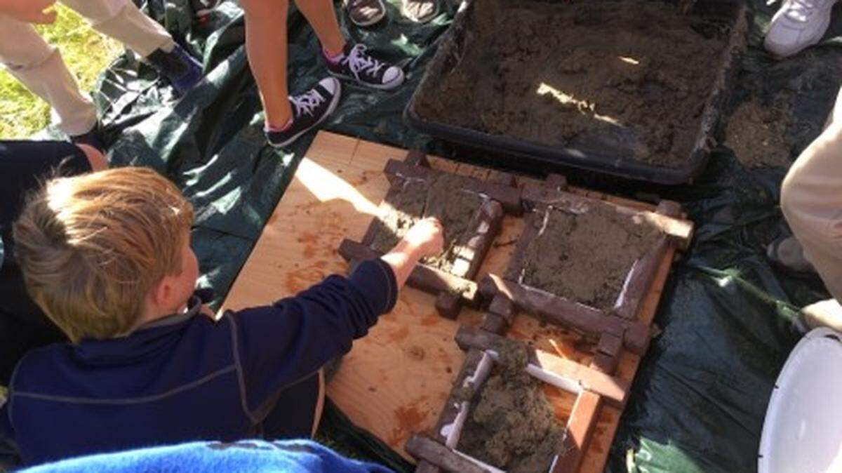 San Miguel fourth-graders learn how to make adobe bricks as part of Caledonia Days.