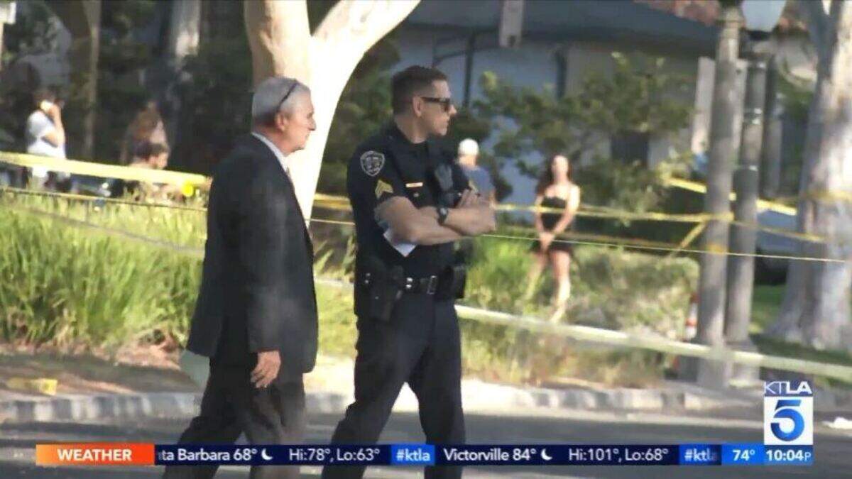 Police at the scene of an officer-involved shooting that happened after officials say a man attacked his sister with a meat cleaver and then charged at officers with a knife in Culver City.