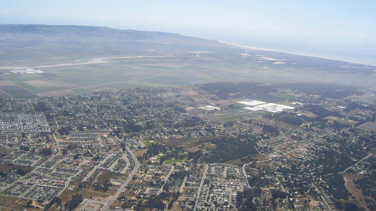 Aerial views of the Nipomo Mesa show a plume of dust that sweeps through the community on windy days.
