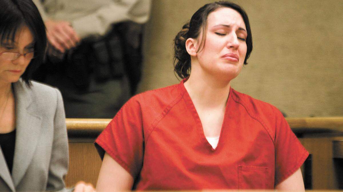 Kaylee Weisenberg reacts while listening Thursday as members of Brett Oswald’s family address her and the court before her sentencing.