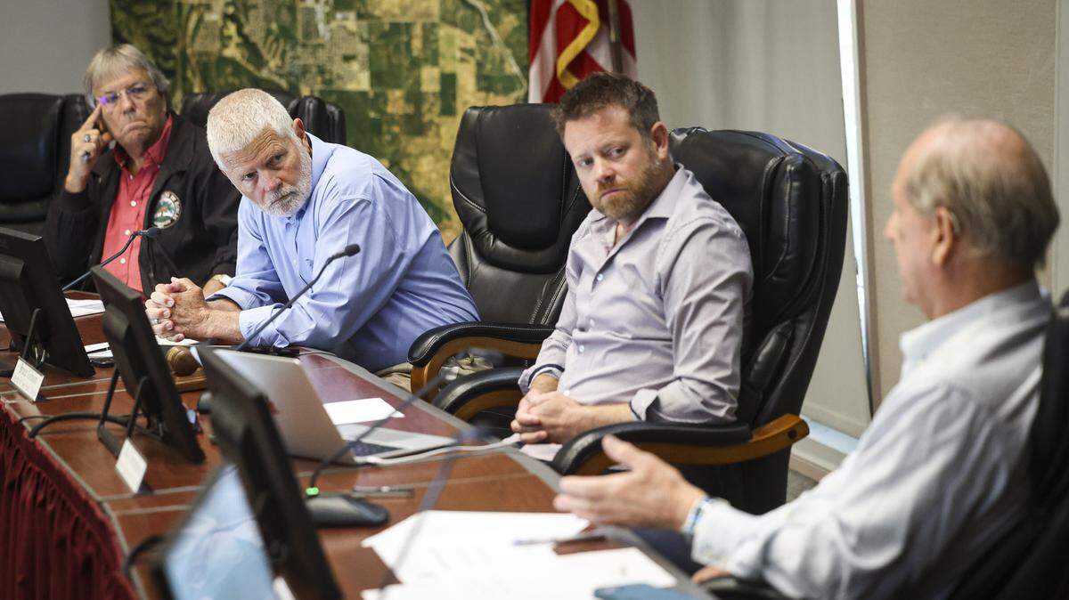 The Paso Robles Area Groundwater Authority Board of Directors discuss ways to fund projects without fees on Aug. 1, 2025. From the left: John Hamon, Bruce Gibson, Matt Turrentine and Jerry Reaugh.