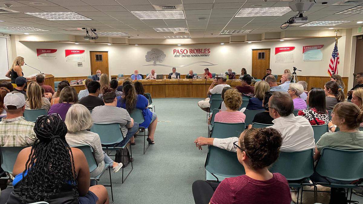 Members of the public watch as Paso Robles Joint Unified School District Deputy Superintendent Jen Gaviola gives a presentation Tuesday on the district’s reopening plan for the 2021-22 school year with various COVID-19 measures in place.