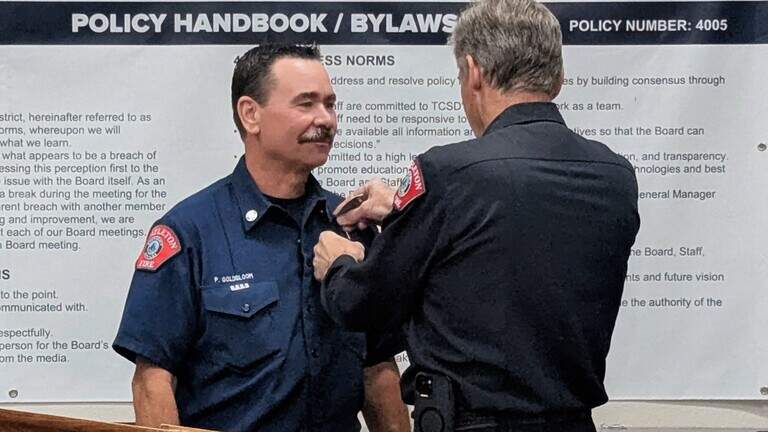 Templeton Fire unveils new badges featuring Feed & Grain building. Here’s a look