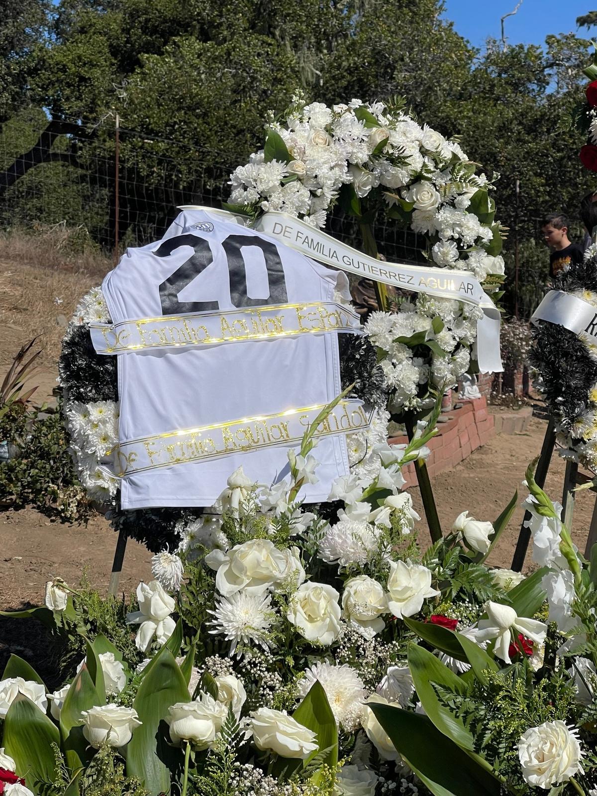 Eric Aguilar, 16, died in a late night crash on Highway 1 near Cambria on Sept. 14, 2024. His number 20 soccer jersey was displayed at his memorial.