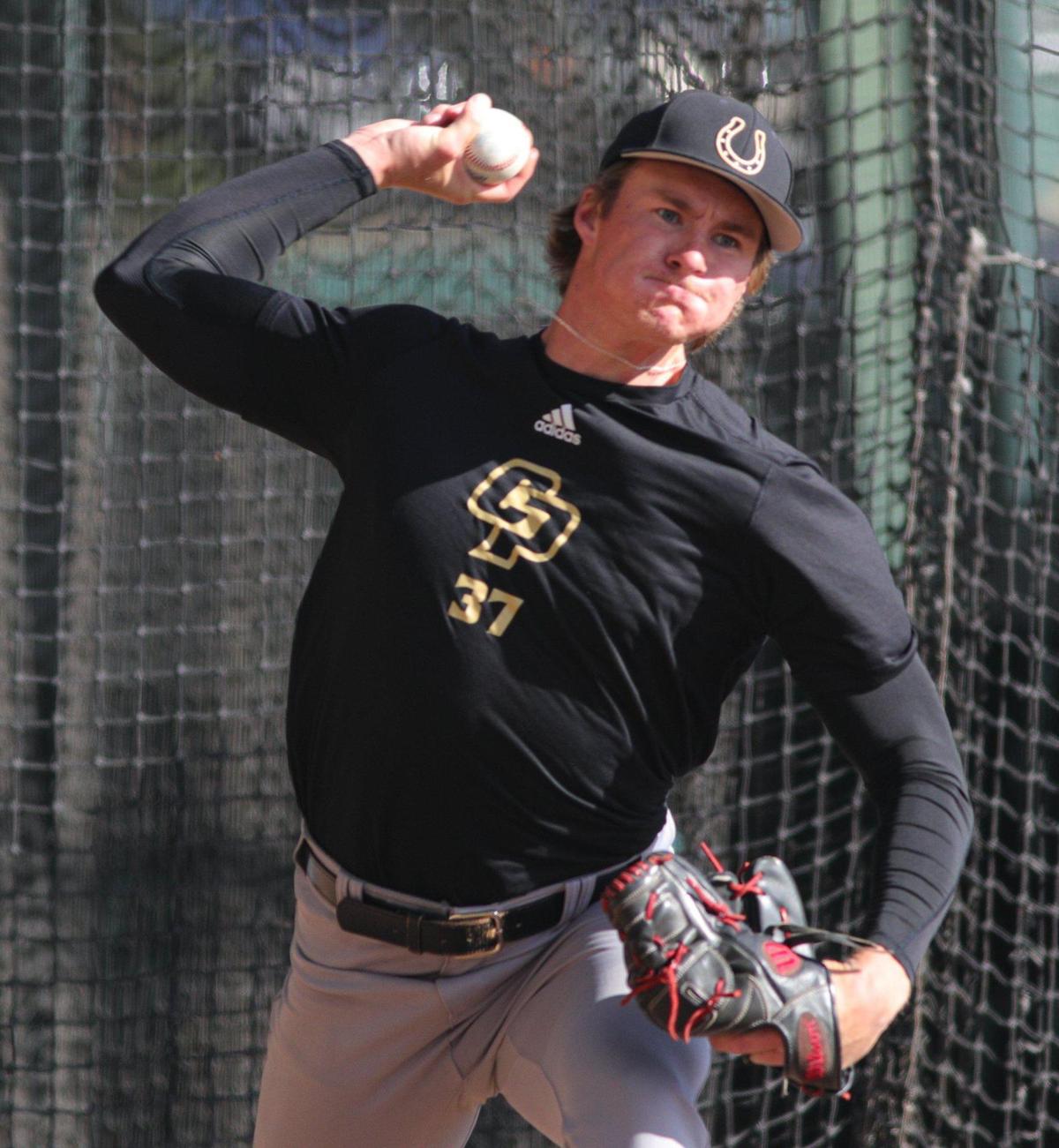Derek True pitches in bullpen as the Cal Poly baseball team practices on Feb. 14, 2023, before opening the baseball season against Missouri State.
