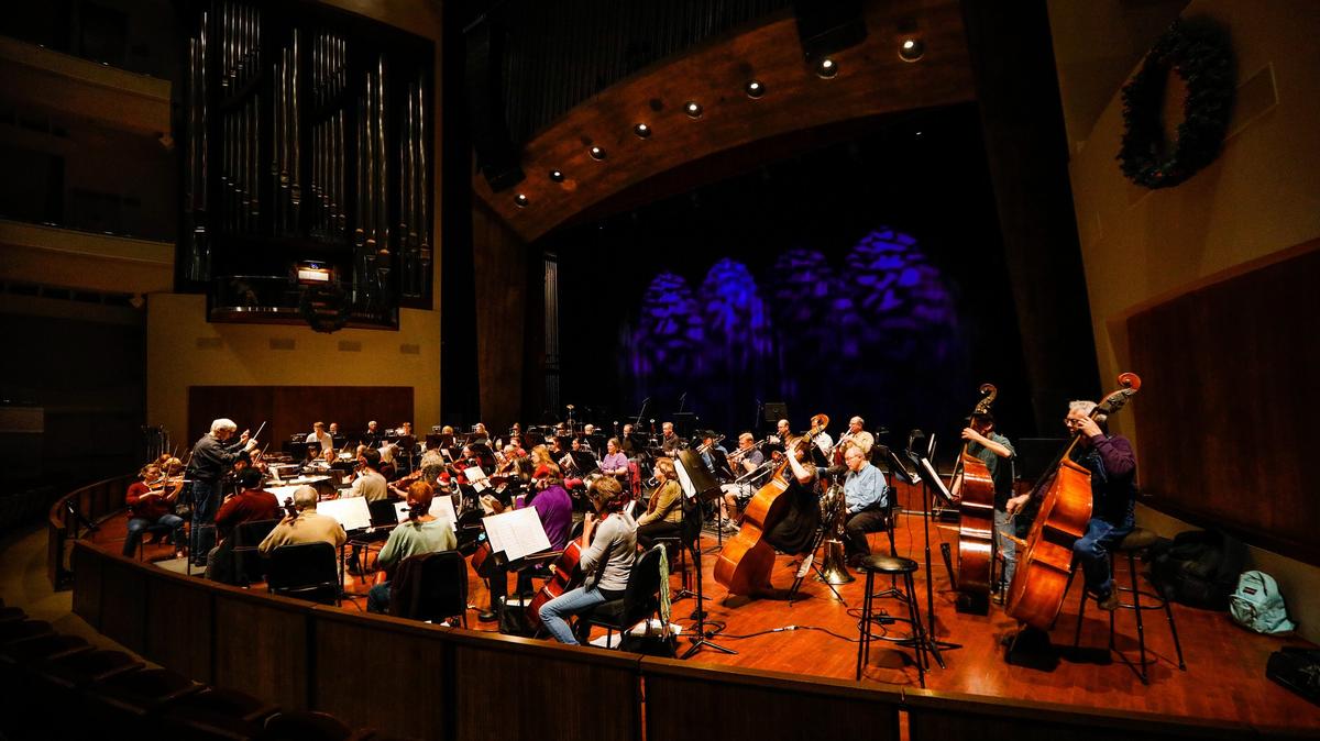 Orchestra Novo under the direction of Michael Nowak rehearse for its New Year’s Eve concert on Monday, Dec. 31, at the Cal Poly Performing Arts Center.