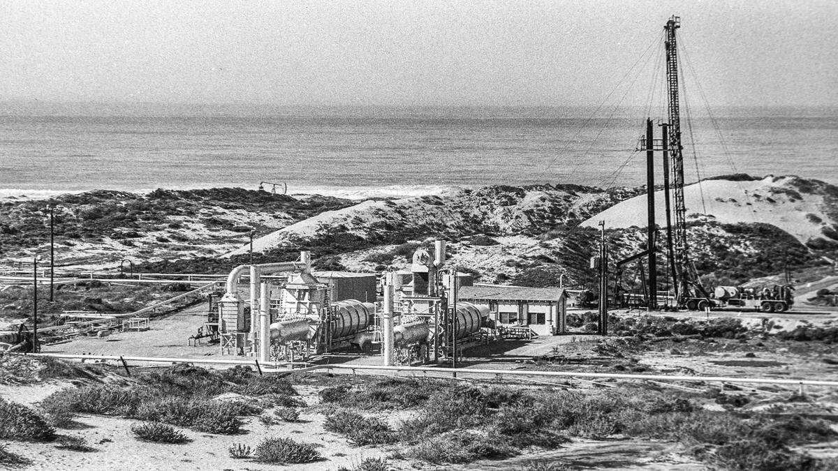 The Unocal oil field at the Guadalupe Nipomo Dunes was shut down in 1994 because a chemical used to help extract the asphalt-like oil product was contaminating nearby areas. Here, the oil field is seen operating on Jan. 19, 1989.