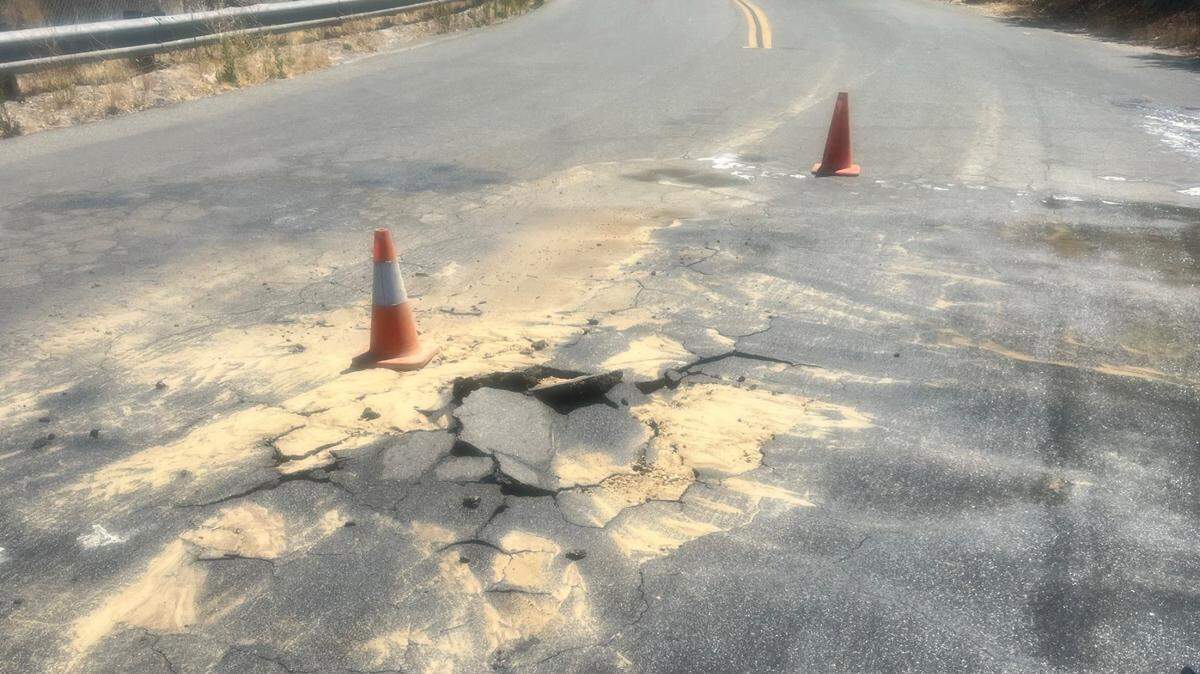 A burst water line created a sinkhole on Nacimiento Lake Drive on Aug. 6, 2022.