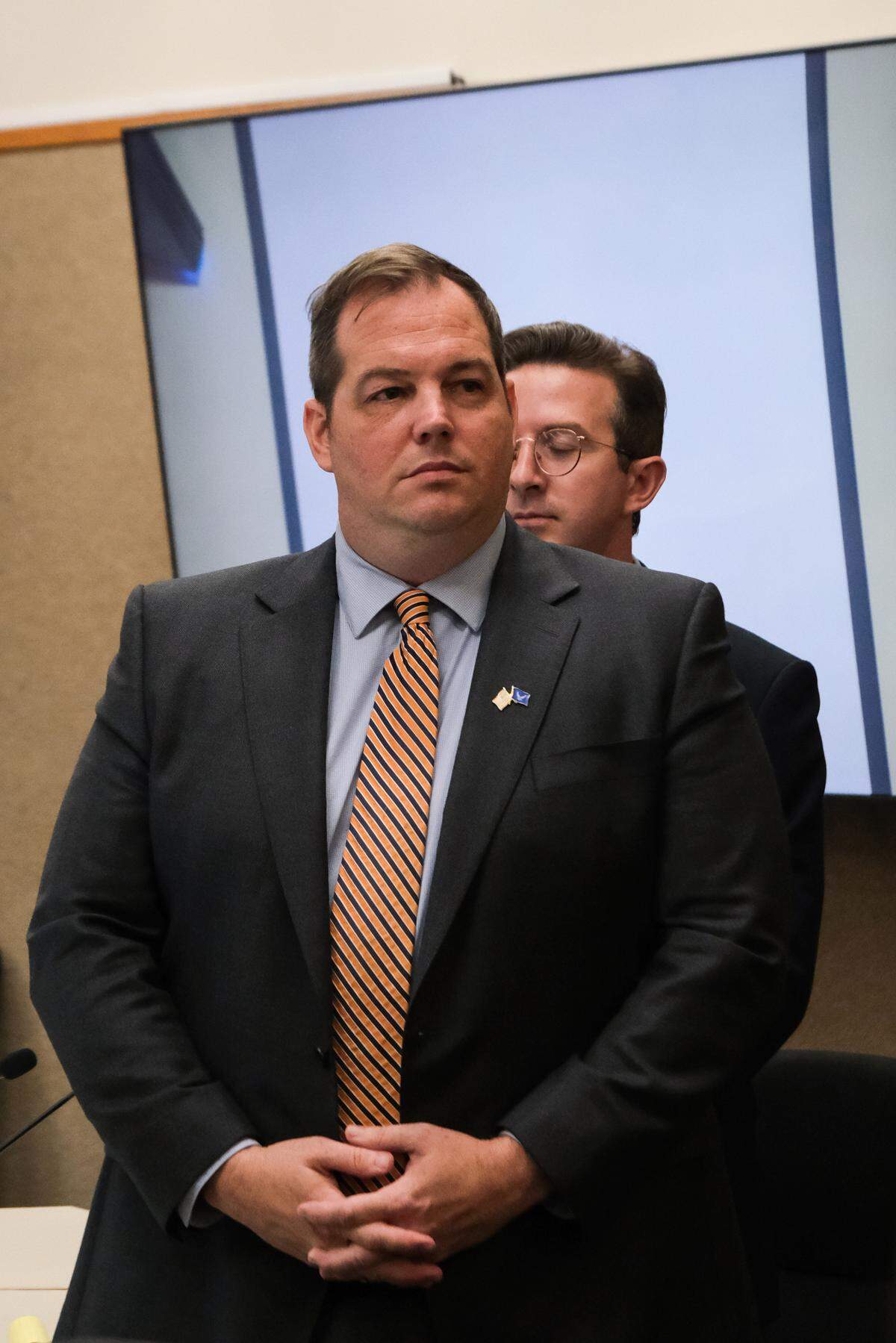 Defense Attorney Scott Taylor stands in front of his client, Nate Abate, during Abate’s criminal trial in San Luis Obispo Superior Court on Oct. 8, 2024. Abate is charged with oral copulation of a minor, rape by intoxication and two counts of rape by force — all felonies.