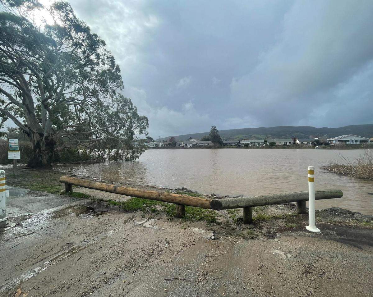 Laguna Lake in San Luis Obispo is almost overflowing on Thursday, Jan. 5, 2023, following a winter storm.