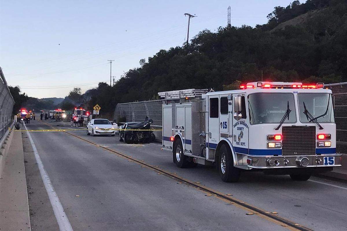 Emergency vehicles respond to a Highway 154 collision near Cold Spring Bridge on Oct. 25, 2019, that killed a Solvang woman and her two young children.