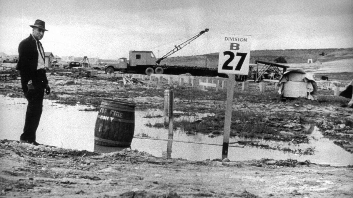 Al Johnson, heavy equipment superintendent, kept the construction of Camp Roberts moving along during record rains in 1940-41.